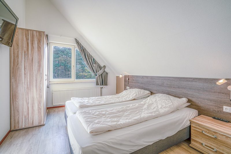 9 Kamperfoelie 31 Texel - Slaapkamer (1)