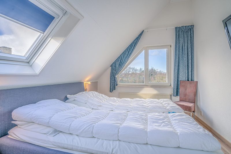 8 Kamperfoelie 55 Texel - Slaapkamer (1)